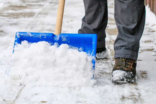 shoveling snow outdoors