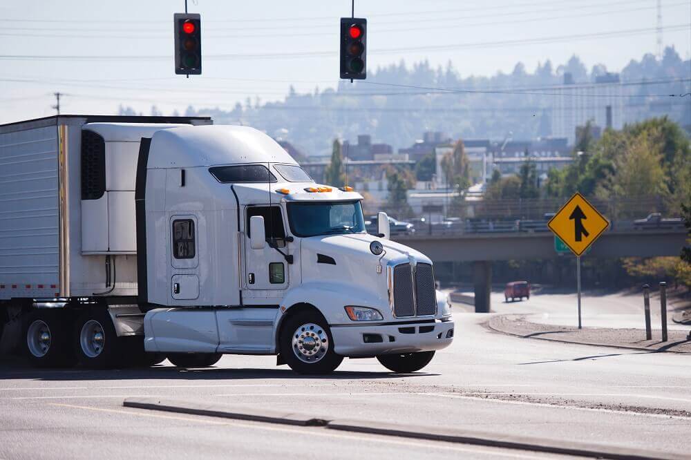 Truck passing interstate highway.